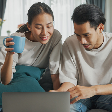 Young married couple going over finances